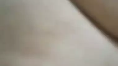 Indian holds a sex camera and touches her own XXX jugs and shaved slit