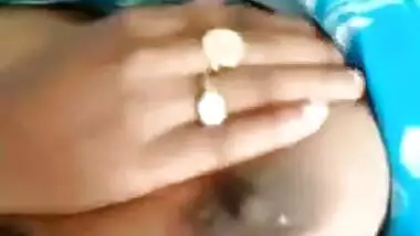 Desi Bhabhi's milking tits exposed in the close-up self-made XXX video