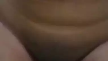 Sexy Desi girl flaunts her sex boobs and XXX snatch holding the camera