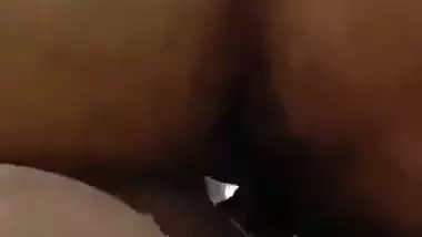 Tamil porn of a girl riding after putting a condom on a dick
