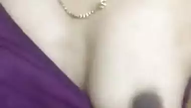 Slender Desi sexpot provocatively flashes small XXX tits on camera