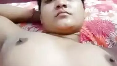 Desi fatty poses in XXX clip with young man who plays with her tits
