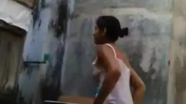 Desi chick puts her sex legs in water performing a XXX washing show