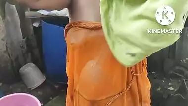 Anita yadav bathing outside with hot